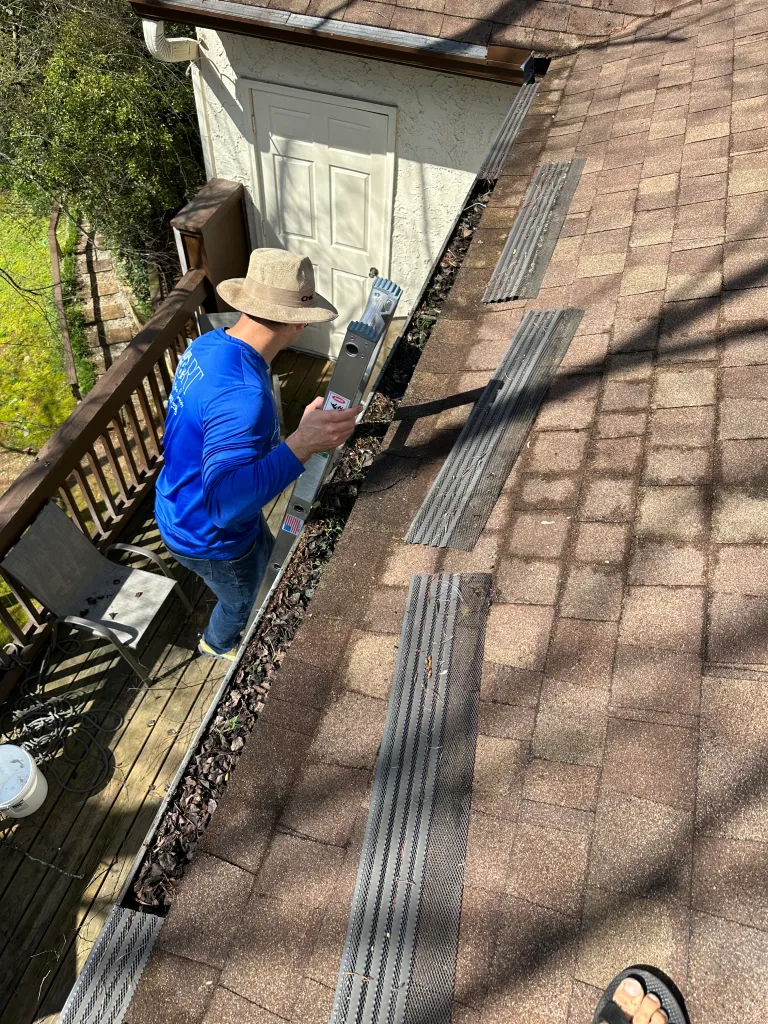 Hart Family Home Services - hand cleqaning gutter